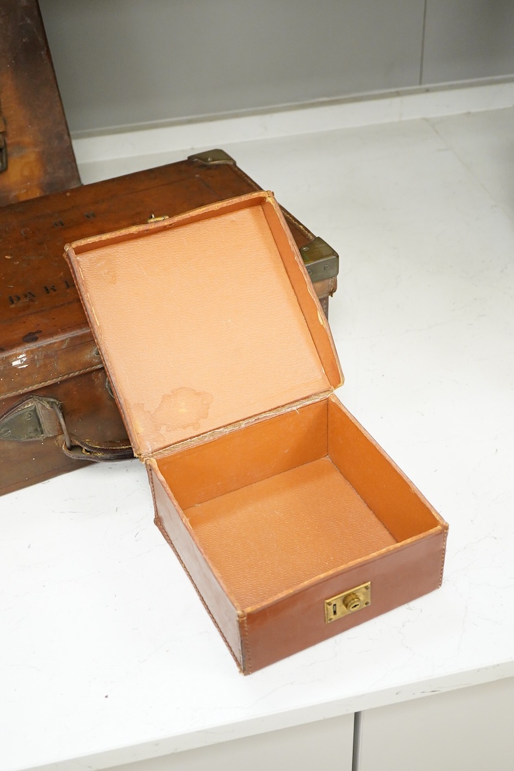 Two late 19th century brown leather magazine cases and another ‘collars’ box, largest 41cm wide
